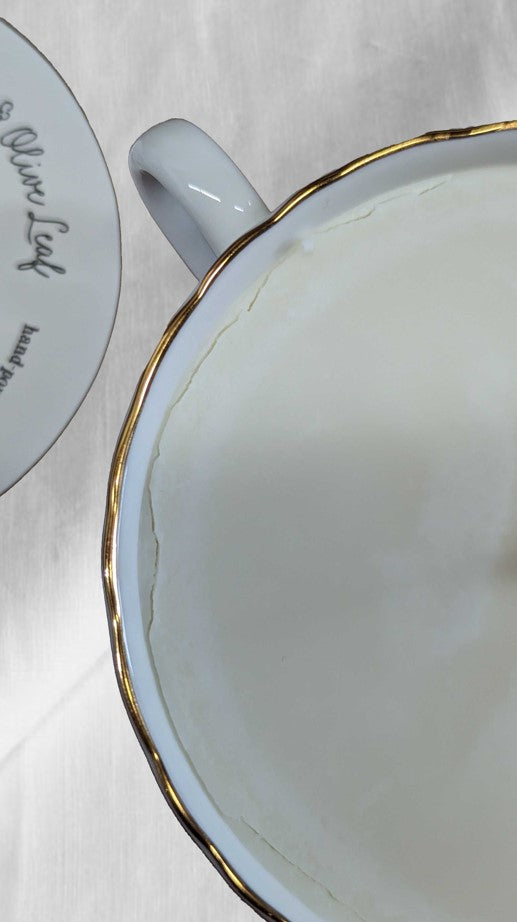 less-than-perfect Peony & Olive Leaf teacup candle without saucer