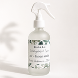 Close-up of Dot & Lil Eucalyptus & Lime Air + Linen Mist in a frosted glass bottle with a white trigger spray.